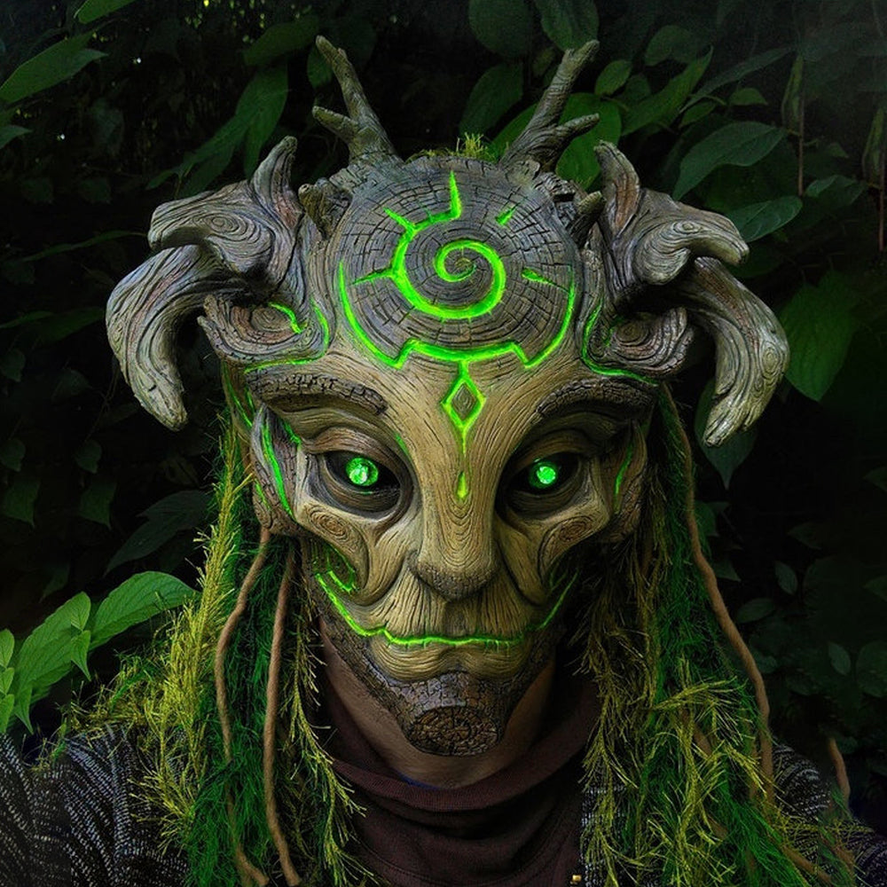Handmade forest spirit mask with luminous green eyes - woodland folklore character