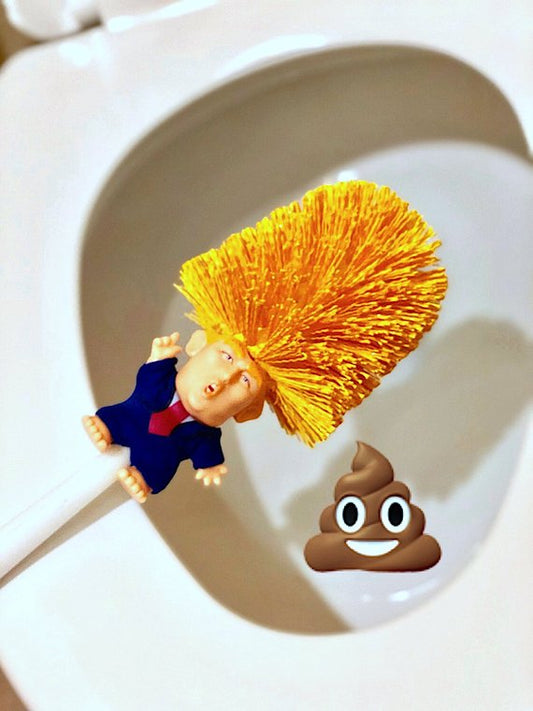 Toilet brush with a character head and emoji poop next to it inside a toilet bowl.